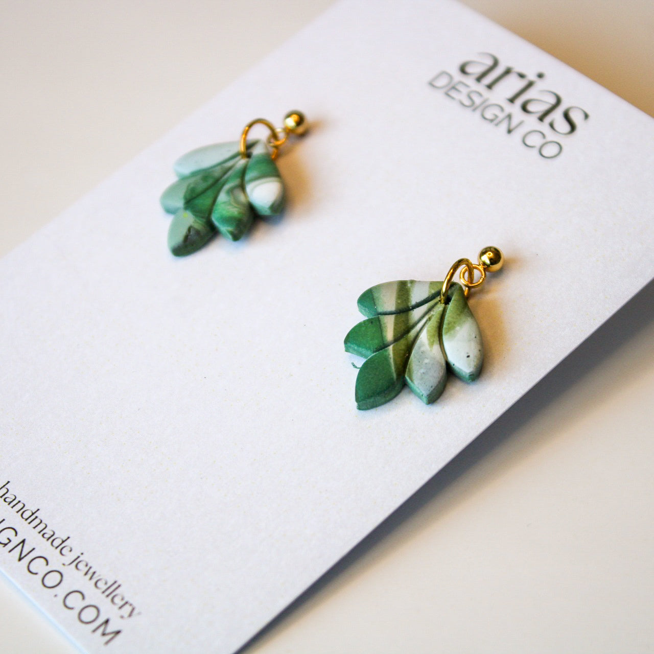 Gold mini leaf earrings handmade in New Zealand for sensitive ears